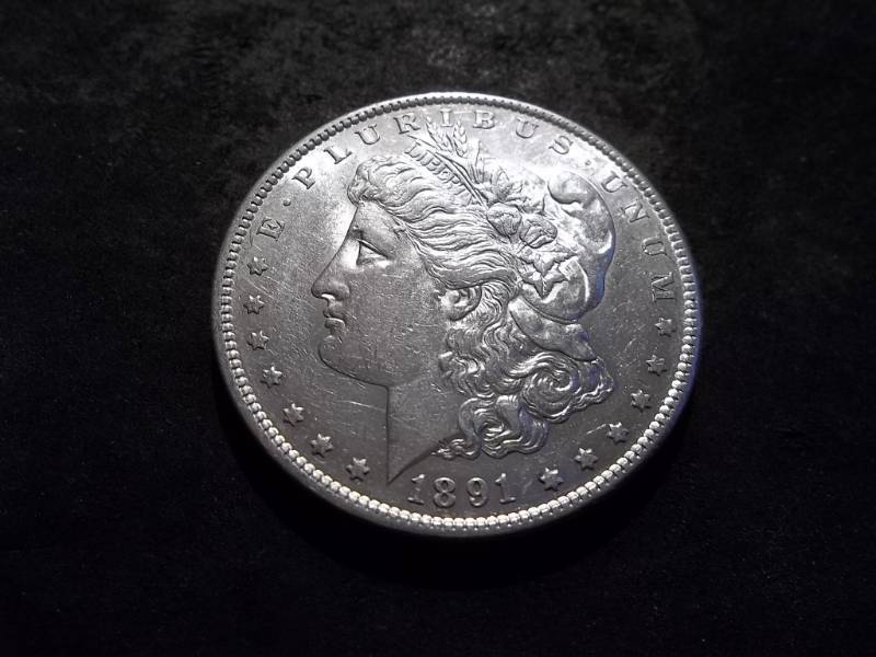 lot 25 image: 1891 S Morgan Silver Dollar