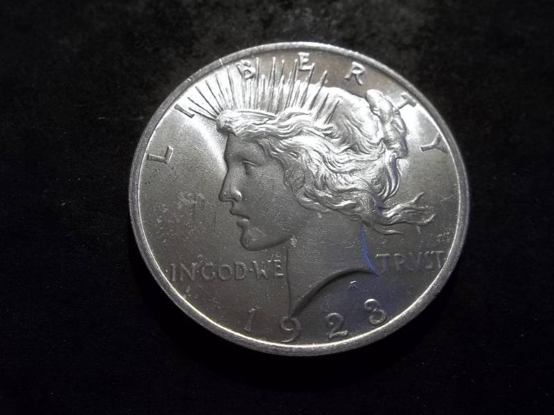 lot 42 image: 1923 Peace Silver Dollar