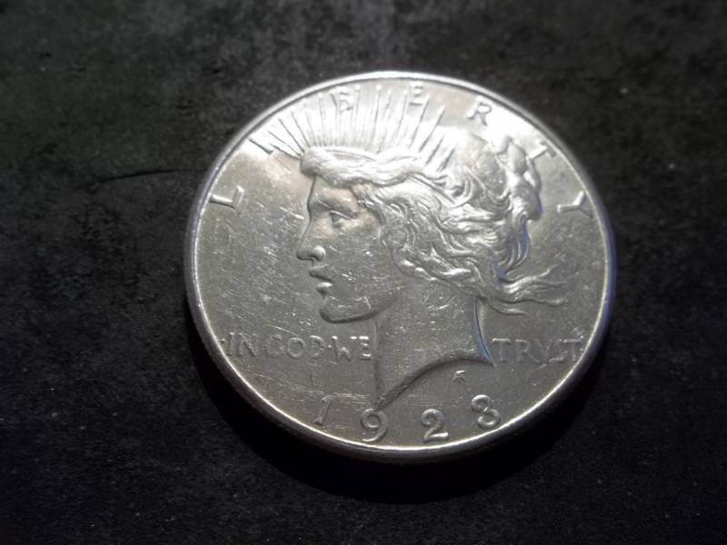 lot 44 image: 1923 S Peace Silver Dollar