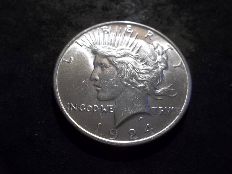 lot 45 image: 1924 Peace Silver Dollar