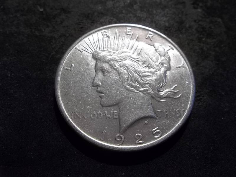 lot 47 image: 1925 Peace Silver Dollar