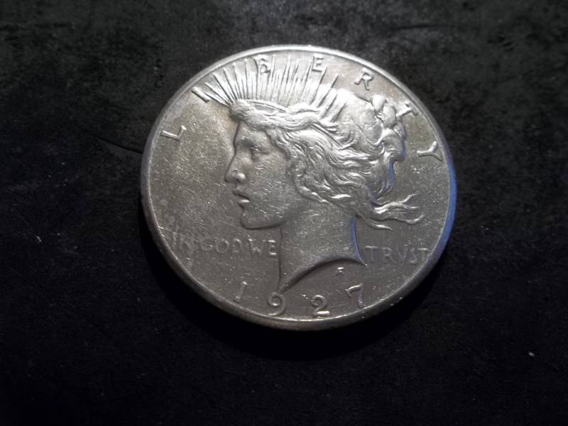 lot 52 image: 1927 Peace Silver Dollar
