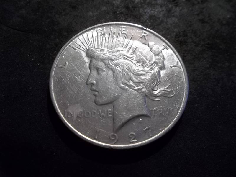 lot 53 image: 1927 D Peace Silver Dollar