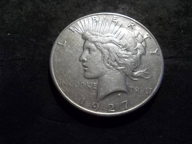 lot 54 image: 1927 S Peace Silver Dollar