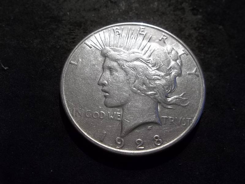 lot 56 image: 1928 S Silver Peace Dollar
