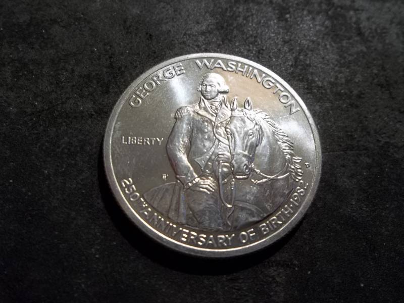 lot 67 image: George Washington 250th Birthday Commemorative Uncirculated Silver Half Dollar