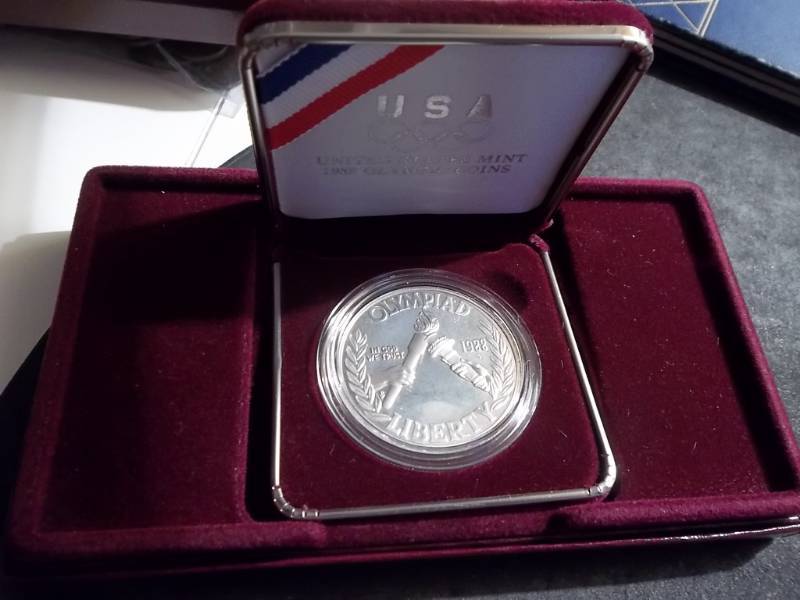 lot 72 image: U.S. Mint 1988 Olympic Silver One Dollar Commemorative Coin