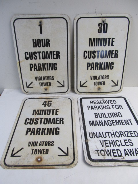 lot 252 image: Lot of 4 Heavy Steel Genuine Parking Street Signs