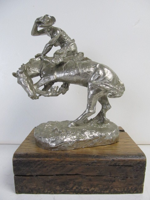 lot 226 image: Vintage Heavy Cast Metal Frederic Remington Sculpture