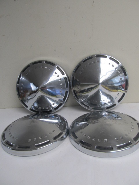 lot 157 image: Matching Set of 4 Vintage Chrome AMERICAN MOTOR Hubcaps 
