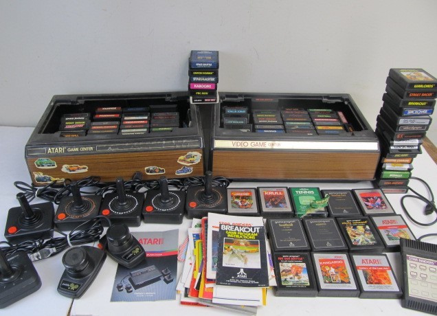 lot 168 image: LARGE Lot of Vintage ATARI Video Games & Joysticks