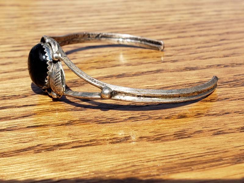 lot 74 image: Sterling Silver and Onyx Southwest Bracelet