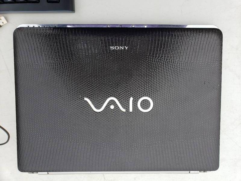 lot 115 image: Sony Vaio Laptop & Logitech Computer Keyboard