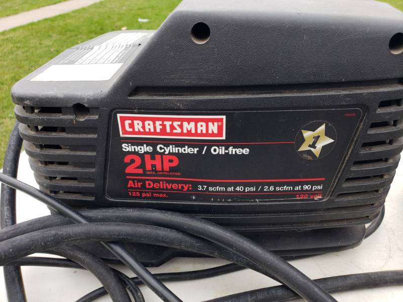 lot 119 image: Craftsman 2 HP Air Compressor, Black & Decker 12V Drill, and Electric Staple Gun