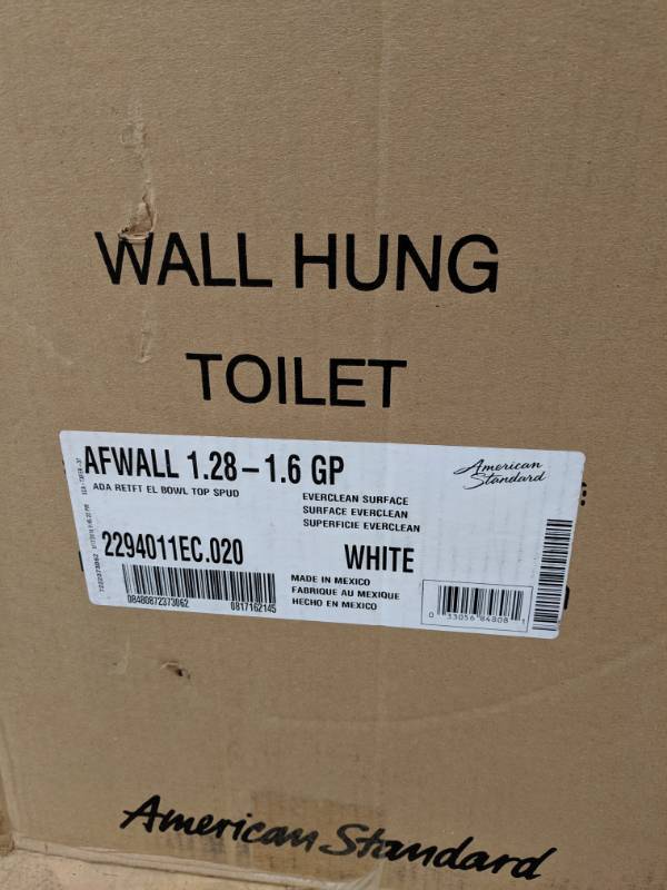 lot 65 image: Lot of 2 American Standard Wall Hung Toilets