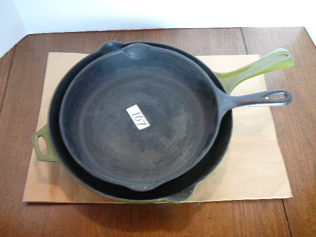 lot 107 image: #8 Cast Iron Skillet & A Large 11 Cast Iron Skillet