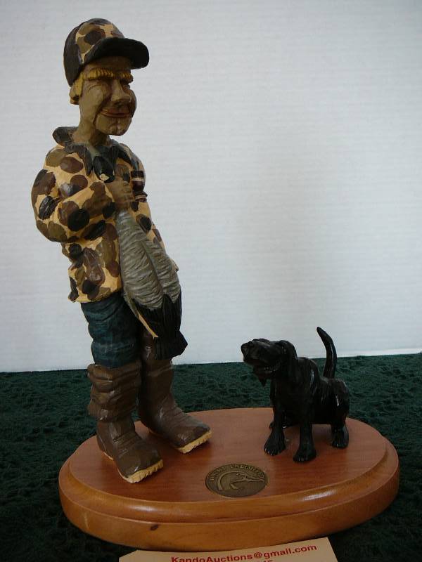 lot 124 image: Ducks Unlimited Duck Hunter & Black Lab Statue