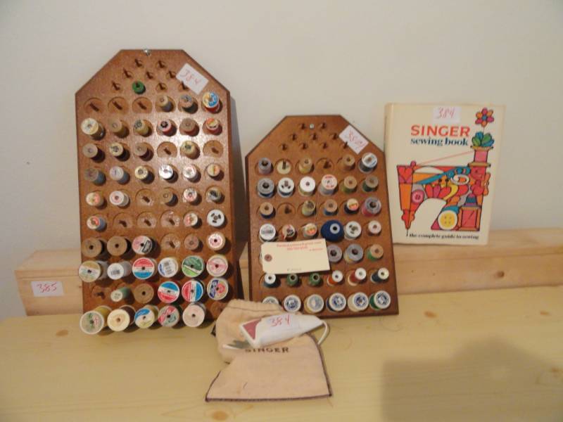 lot 384 image: Thread Racks Wall Mount with Thread Singer Sewing Book