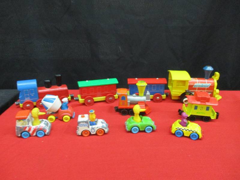lot 140 image: Old Fisher Price Toys and Seseme Street Collector Cars