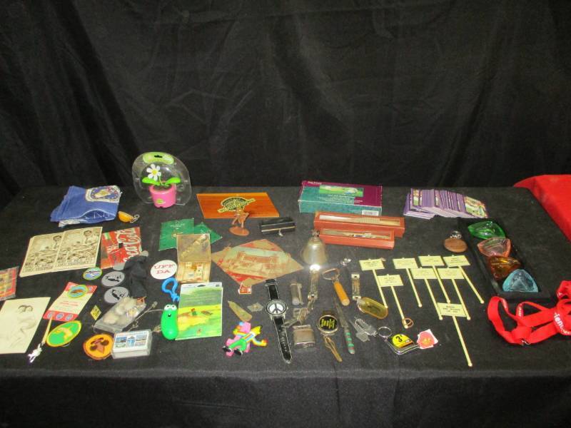 lot 145 image: Memorbelia, Antiques, Collectibles, Post cards, Football Collector cards, Lighters, letter openers, beaded serving pieces and so much more