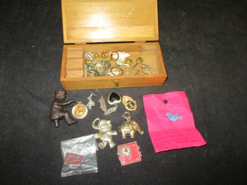 lot 165 image: Various pieces of Gold Pins, Cast Iron Man for a stage coach and more