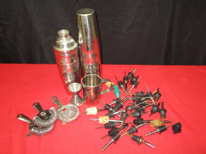 lot 63 image: Shaker Cups and Bottle Pourer Tops