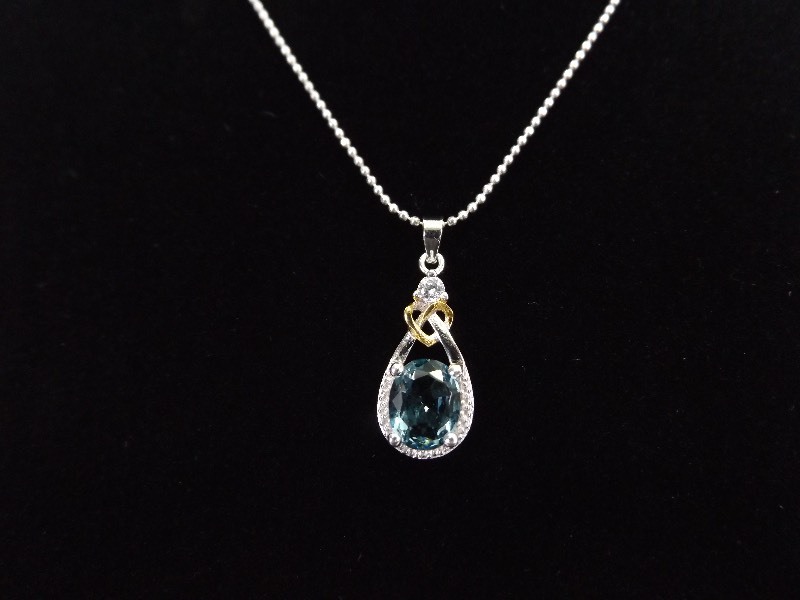 lot 4 image: .925 Sterling Silver Diamond Accented Faceted Topaz Crystal Necklace Pendant
