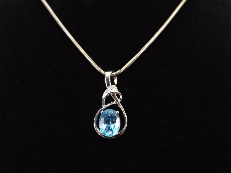 lot 5 image: .925 Sterling Silver Faceted Topaz Crystal Necklace Pendant