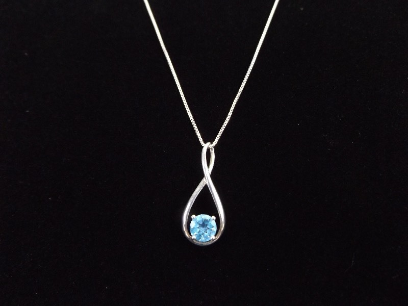 lot 6 image: .925 Sterling Silver Faceted Topaz Necklace Pendant