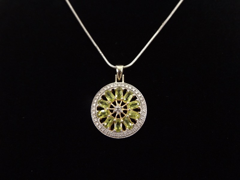 lot 7 image: .925 Sterling Silver Diamond Accented&nbspPeridot&nbspCircle Necklace Pendant