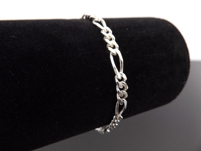 lot 31 image: .925 Sterling Silver Figaro Link Bracelet