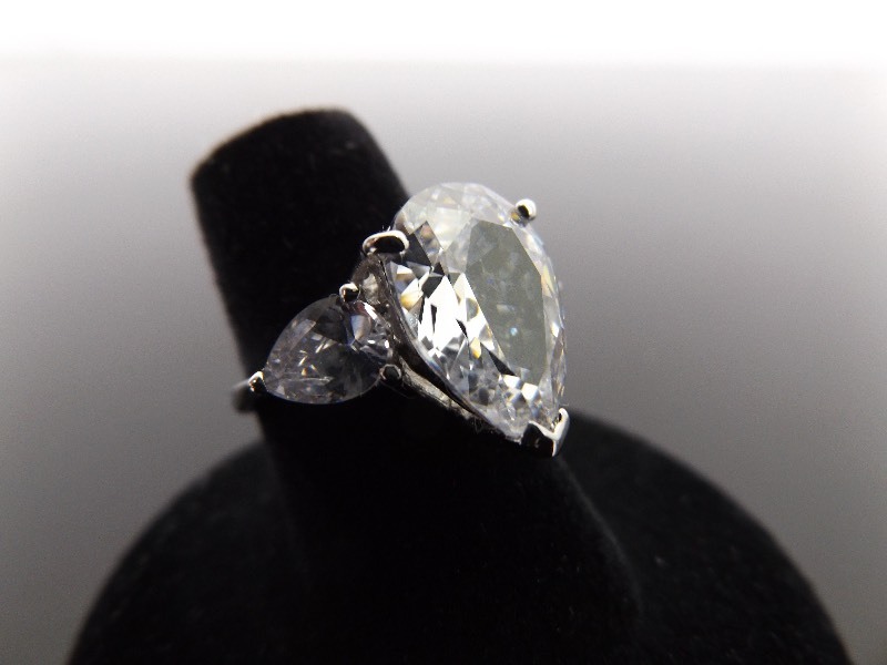 lot 71 image: .925 Sterling Silver Pear Cut Crystal Ring Size 6