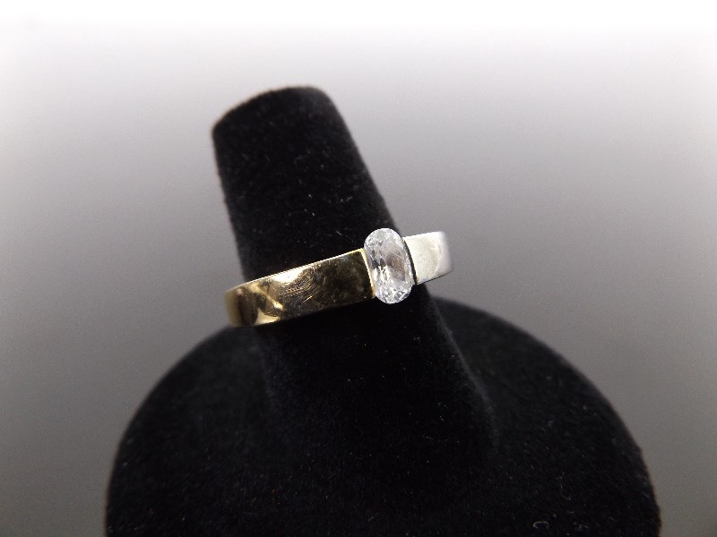 lot 81 image: .925 Sterling Silver Gold Shouldered Oval Cut Crystal Ring Size 7.25