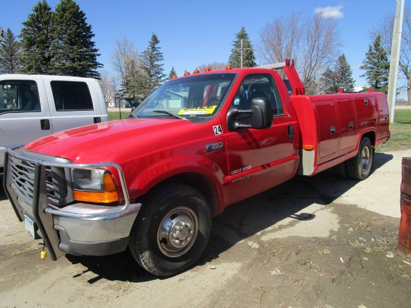 lot 14 image: 1999 Ford 350 with Service Body, Tommy Lift and Goose neck Hitch  #24
