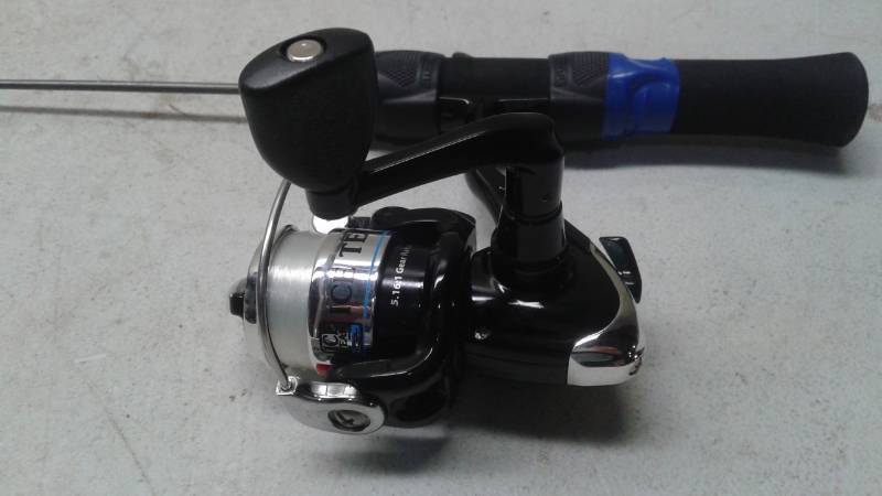 lot 29 image: Ice Team Fishing Pole,Has Tape On Handle