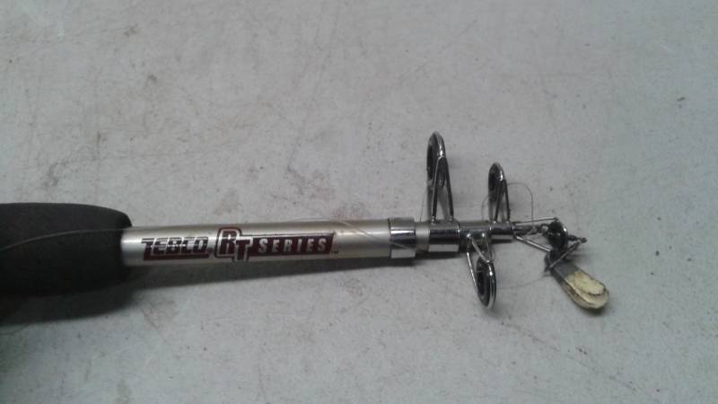 lot 33 image: Zebco RT Series Telescoping Fishing Rod Pole With A Genesis Reel