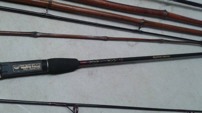 lot 35 image: Lot Of Fishing Rods And A Reel, The Stick One Has A Crack In It