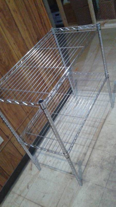 lot 61 image: Metal Wire Adjustable Shelf. All Four Bars Are not The Same