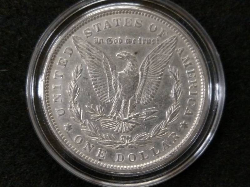 lot 8 image: 1879 Rev 79 Morgan Silver Dollar...