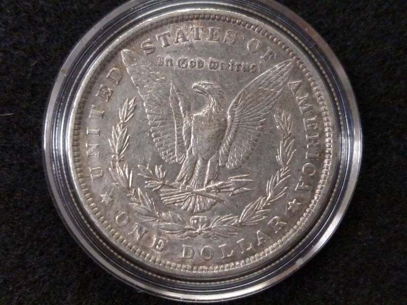 lot 9 image: 1880 Morgan Silver Dollar...
