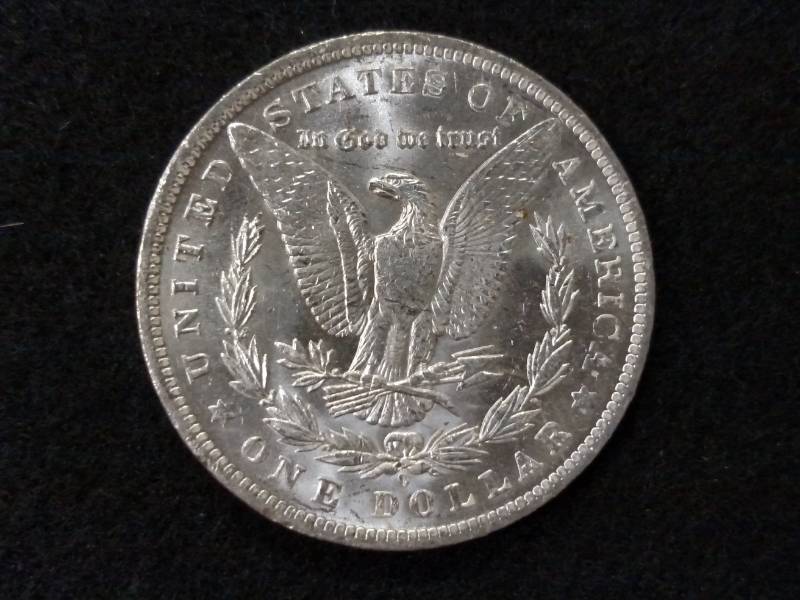 lot 12 image: 1884 O Mint State Plus Morgan Silve...
