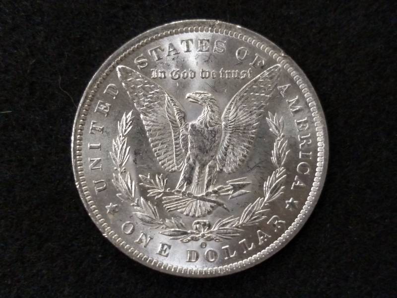 lot 13 image: 1885 O Mint State Plus Morgan Silve...