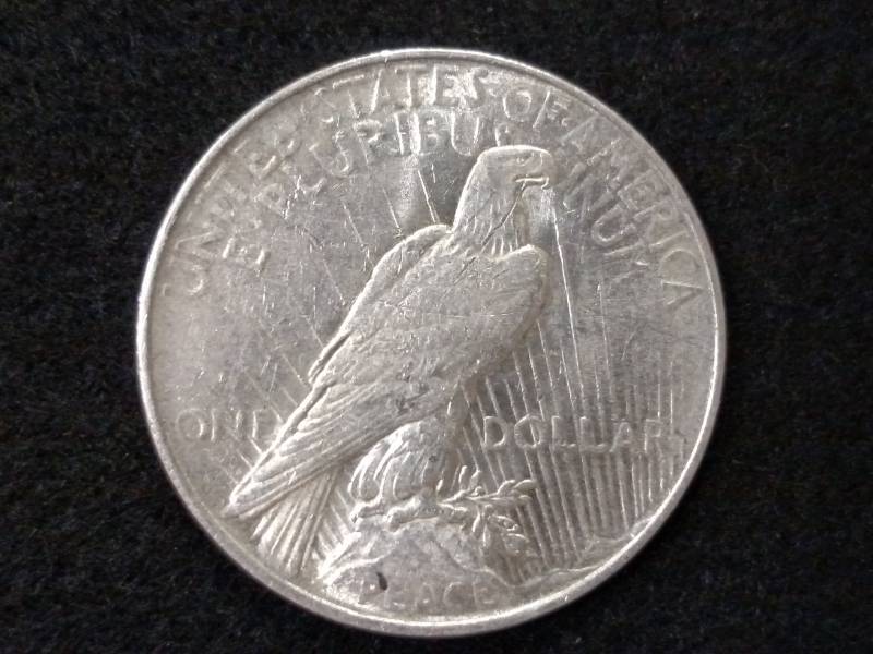 lot 29 image: 1922 Peace Silver Dollar...