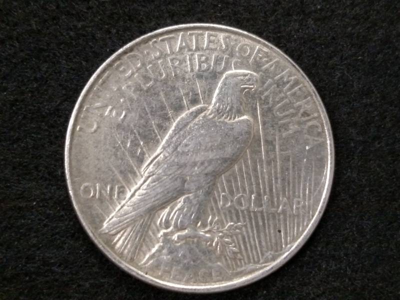 lot 31 image: 1922 Peace Silver Dollar...