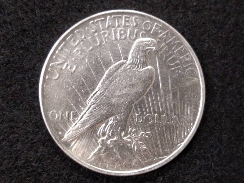 lot 34 image: 1922 D Peace Silver Dollar...