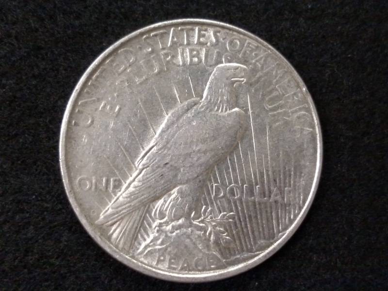 lot 35 image: 1922 D Peace Silver Dollar...