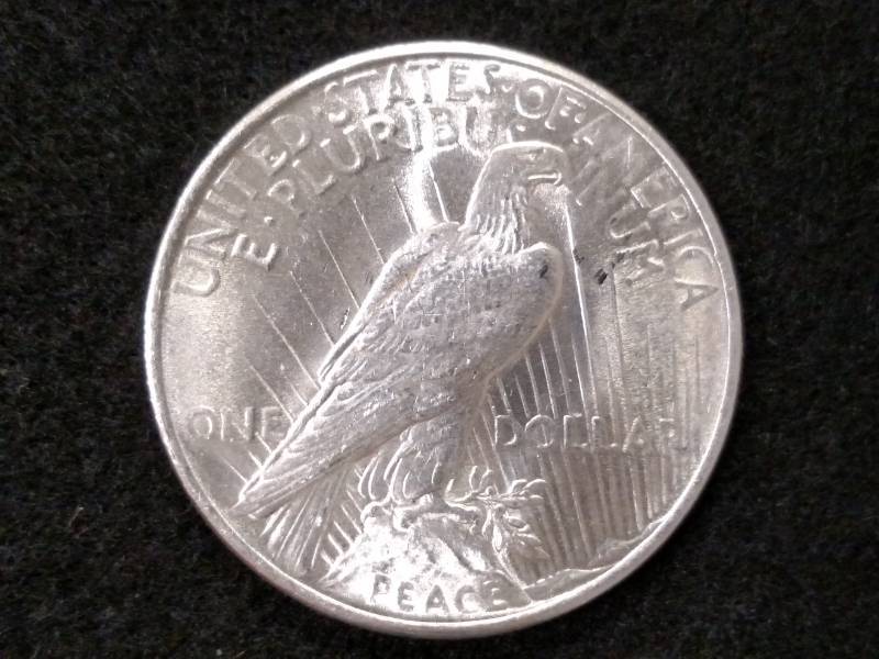 lot 42 image: 1924 Peace Silver Dollar...