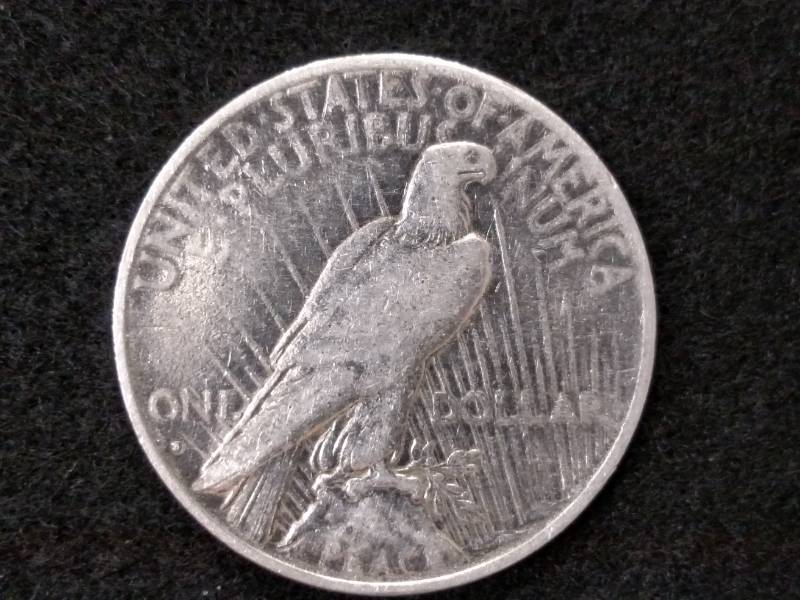 lot 49 image: 1935 S Peace Silver Dollar...