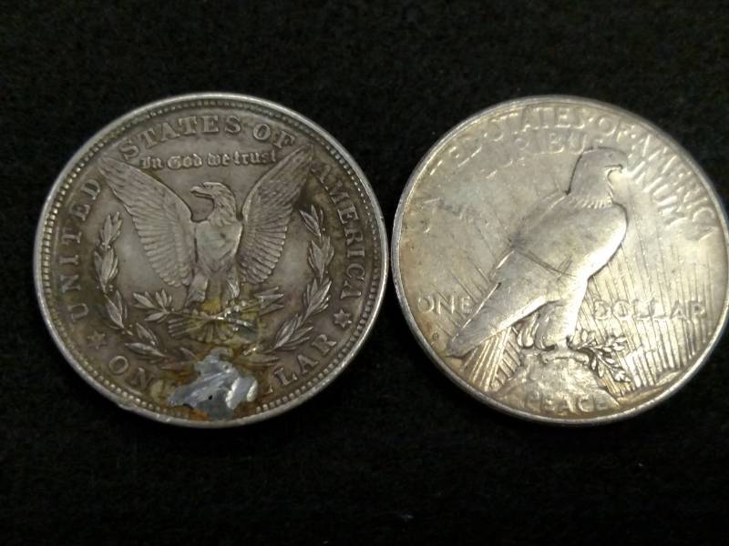 lot 51 image: (2) Silver Dollars...