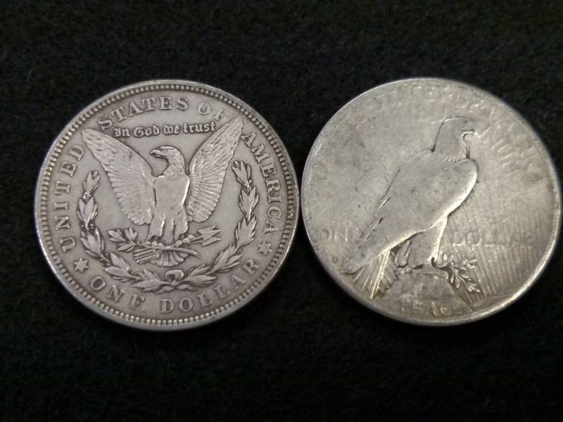 lot 52 image: (2) Silver Dollars...